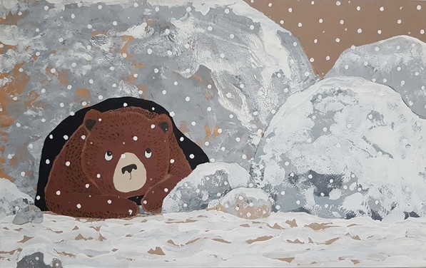 the bear cub and snowy morning